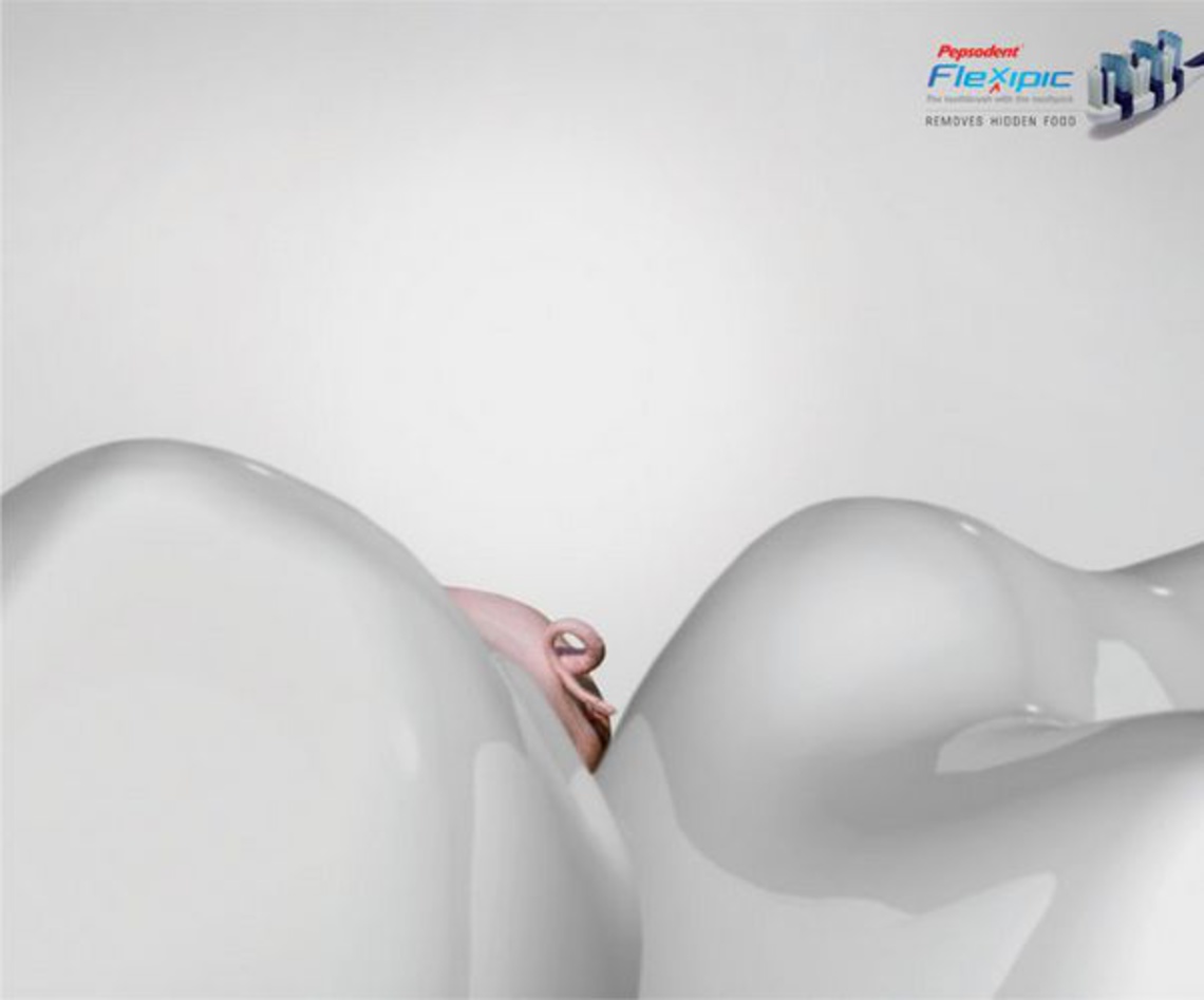 (Pepsodent Flexipic. The toothbrush with the toothpick. Removes hidden food.) Campaign for the
Pepsodent Flexipic toothbrush.