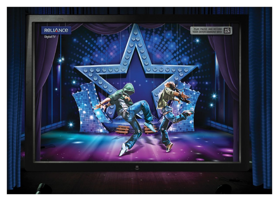 (Play, pause and record your entertainment with HD DVR.) Campaign for Reliance Digital TV, an Indian TV service provider.