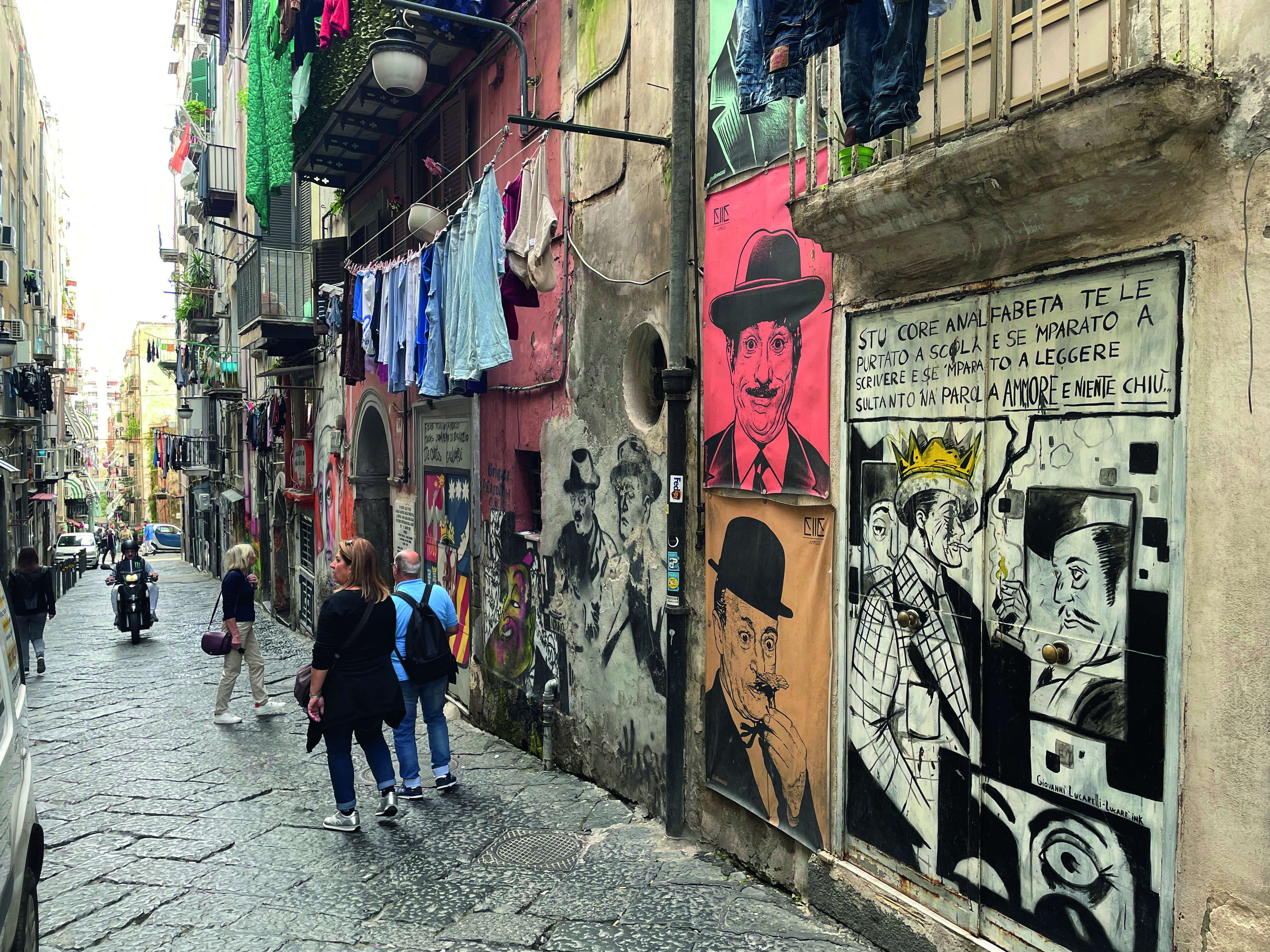 typical naples street rich with ‘unapproved’ mixed-media